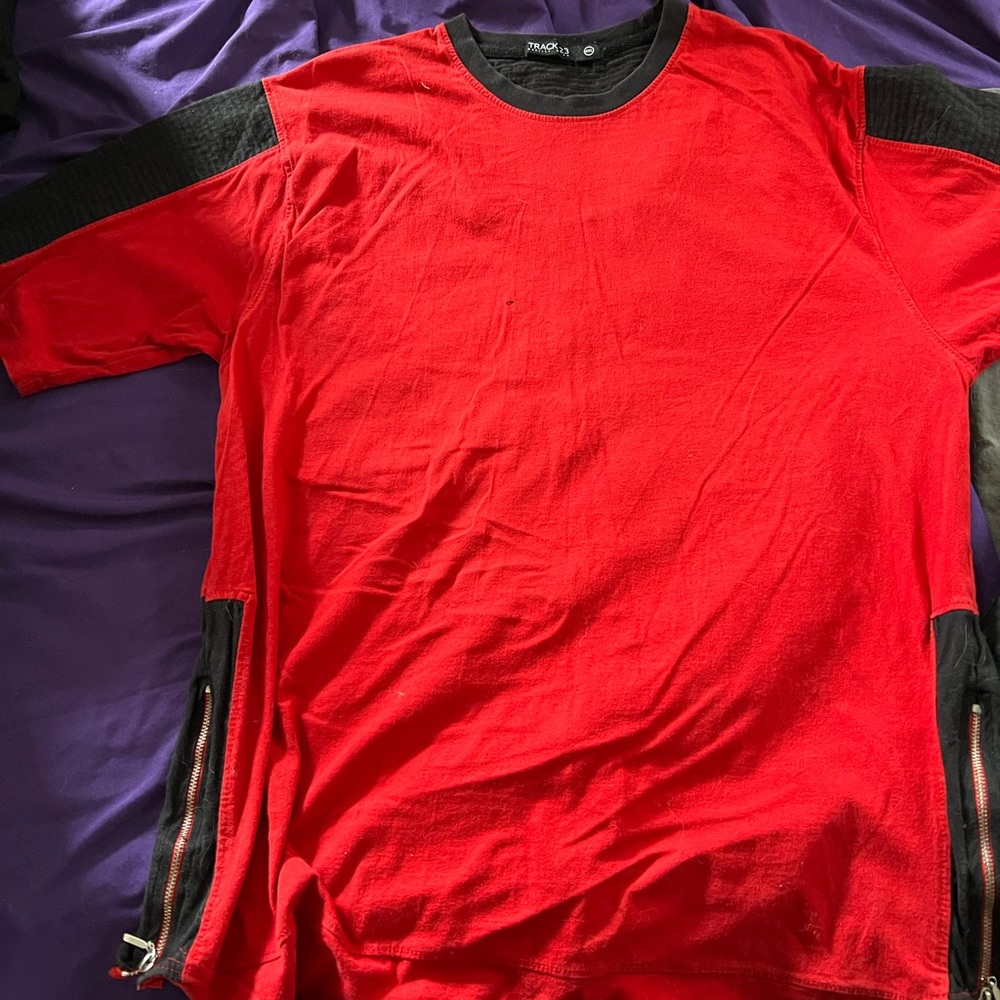 This shirt was nice but I never wear it anymore fits like a 2xl